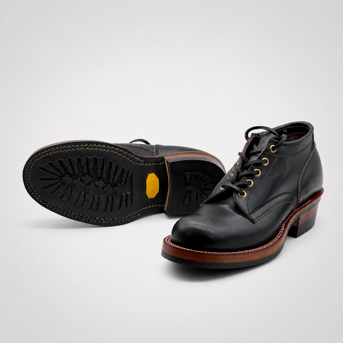 Mens Black Full-Grain Leather Gold Eyelet Chukka Work Boots - Striped Heel Vibram Sole